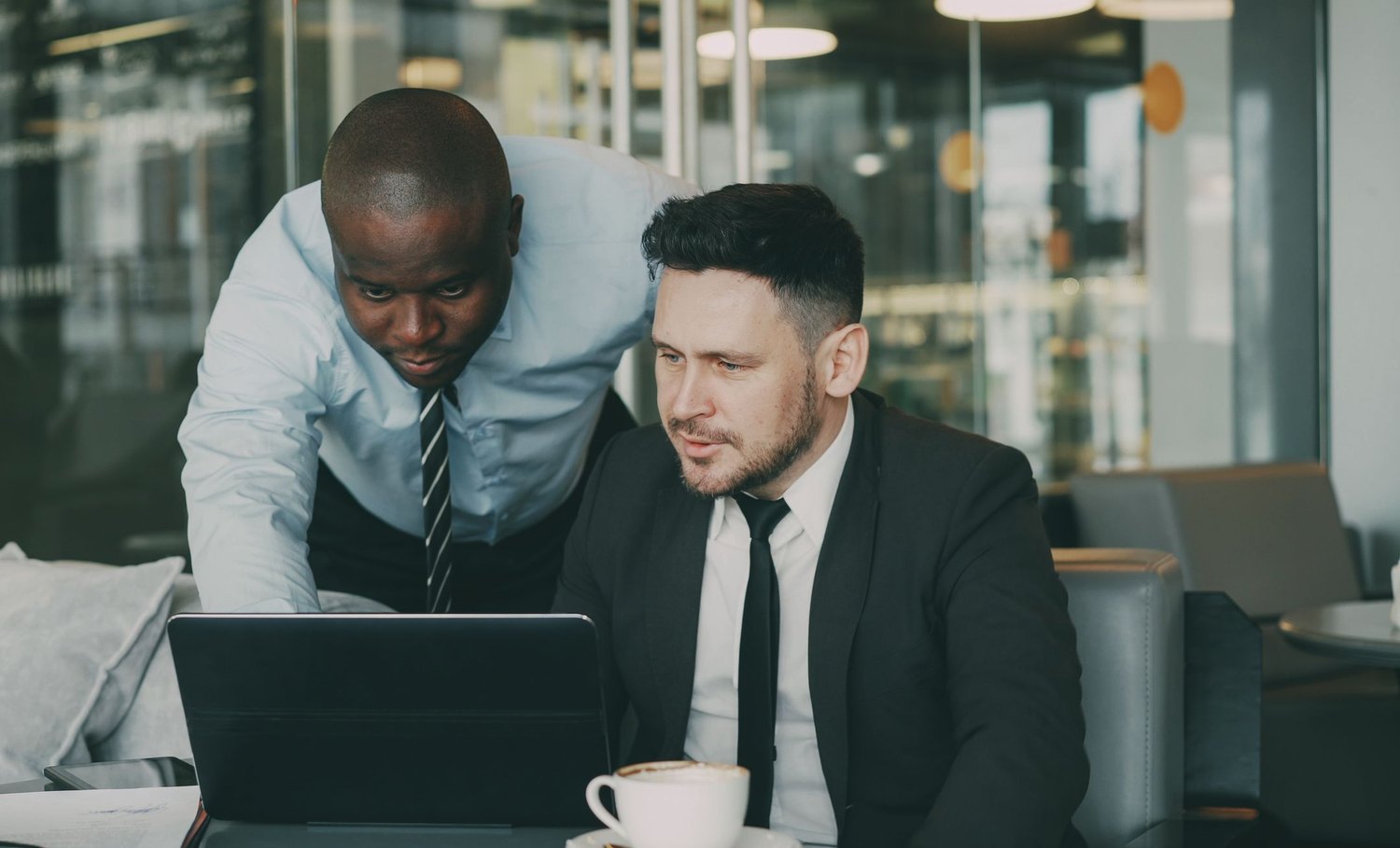Two solicitors working through a case together